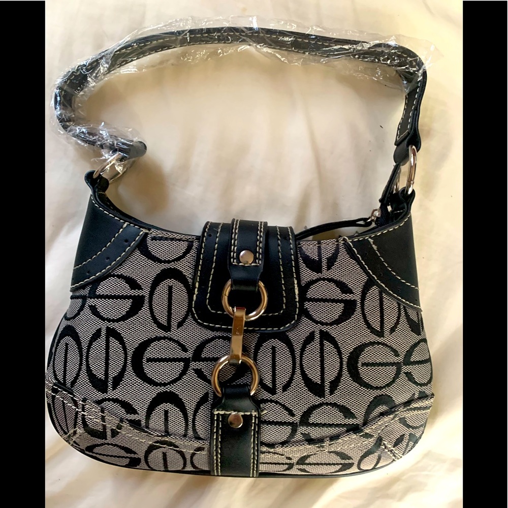 Brand new purse with stuffing & handle cover!